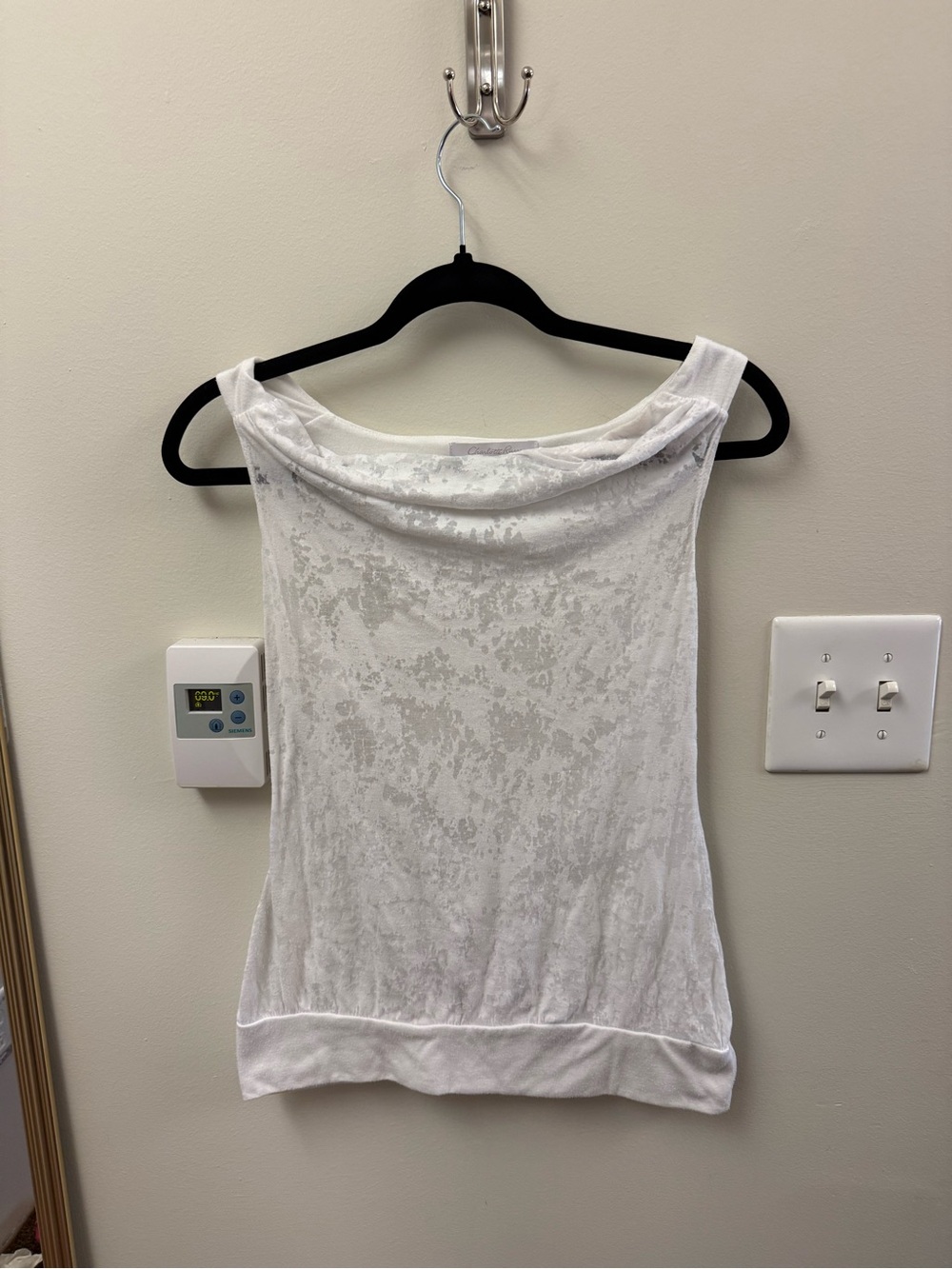 white top with semi-sheer pattern